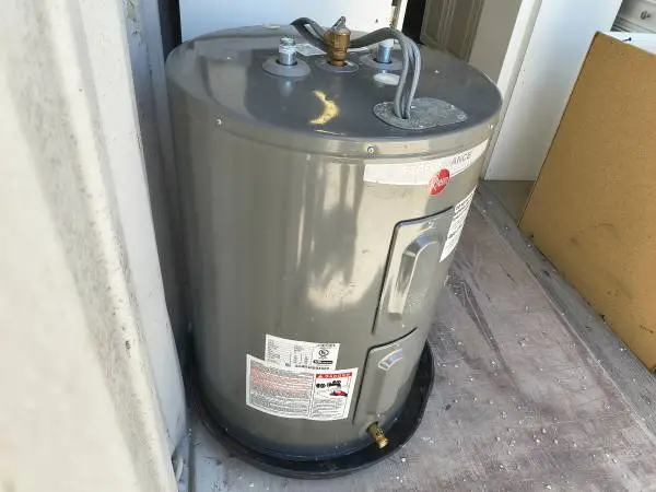 Grey Rheem Performance Water Heater Model # XE38S06ST45U1 Used