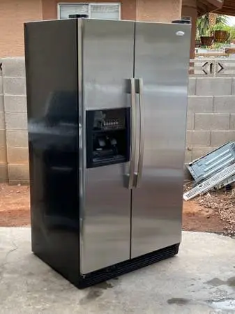 BLACK STAINLESS WHIRPOOL REFRIGERATOR SIDE BY SIDE