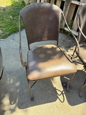 2 rustic Wrought Iron Inside/outside Brownish in color.