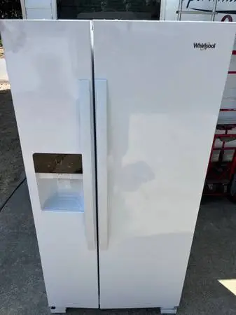 Clean white whirlpool refrigerator will deliver and install