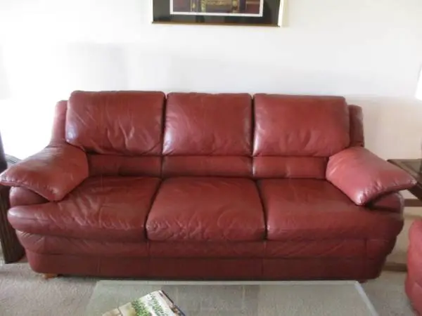 Natuzzi leather sofa, chair & ottoman - brick color