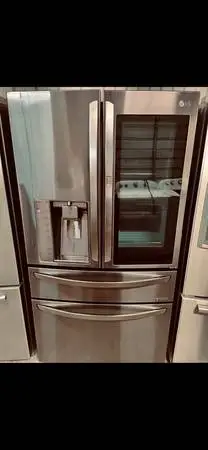 LG black stainless refrigerator with instaview glass door