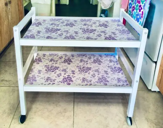 Wood Farmhouse wheeled cart. White w/purple flowers print w/2 shelves CL ad