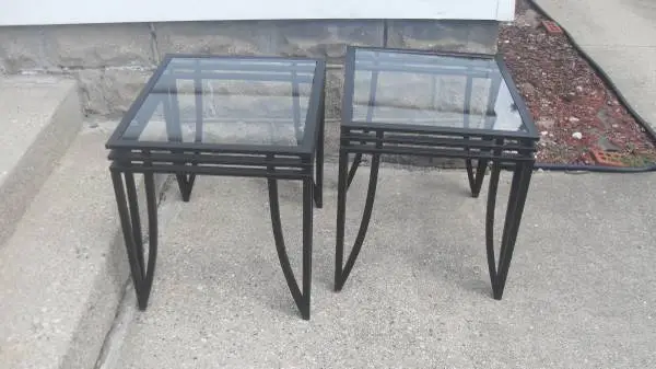 Two black metal with glass tops end tables 20 x 23.5 25$