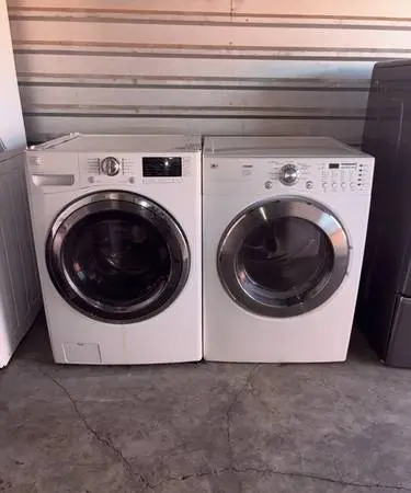 White Kenmore Washer And LG Dryer