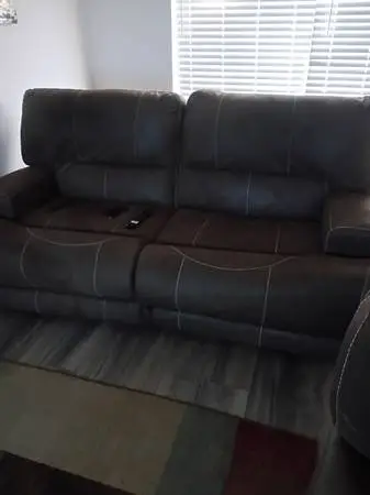 Two couches each couch recline