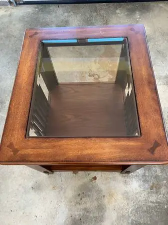 Glass top end table $25