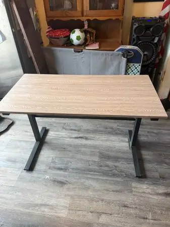 Adjustable height desk