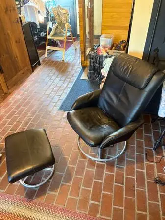Swivel/Reclining Leather Chair With Foot Rest Ottoman In Good Shape