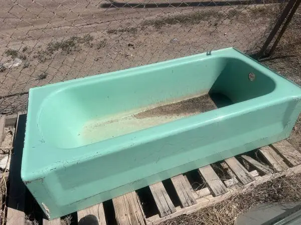 Beautiful vintage mint green jade green cast-iron 1950s bathtub