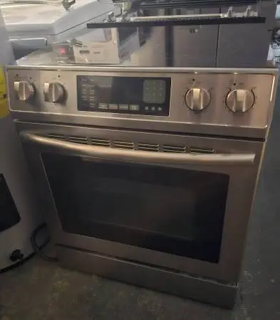 STAINLESS STEEL SLIDE  IN GLASSTOP STOVE CONVECTION OVEN ......$ 400