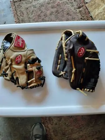 Two Rawlings baseball gloves in excellent condition