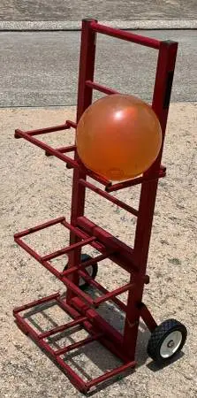 Vintage steel bowling ball rack with wheels