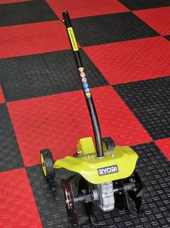 Brand New RYOBI Expand-It Universal Tiller String Trimmer Attachment