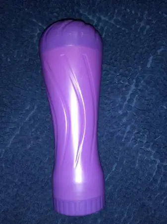 Adult toy with bottle of lube