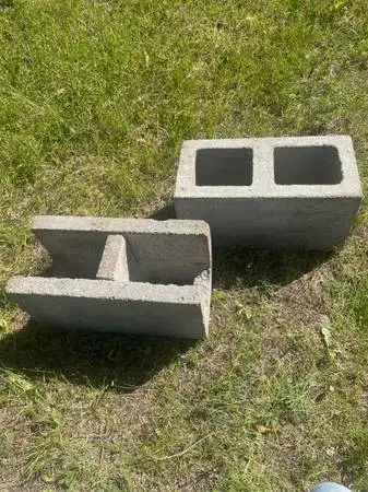 3 large concrete cinder blocks