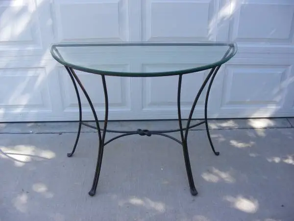 Glass and iron half moon sofa table