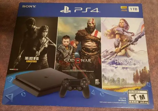 PlayStation 4 PS4 Slim 1TB Console VG Condition Adult Owned