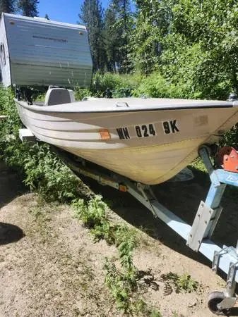 16 ft Mirro Craft aluminum tiller.