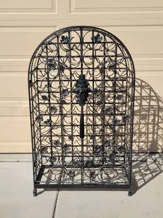 Wrought iron wine rack locking cage doors