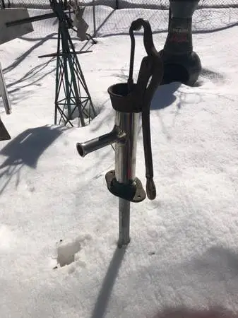Vintage hand pump by Athol co.