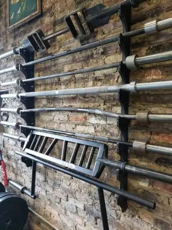 Powerlifting and strongman specialty Olympic barbells and gym equipment