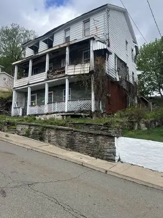 A Side by Side Double! 3 bed &1 bath on Each Side! Needs Full Rehab!