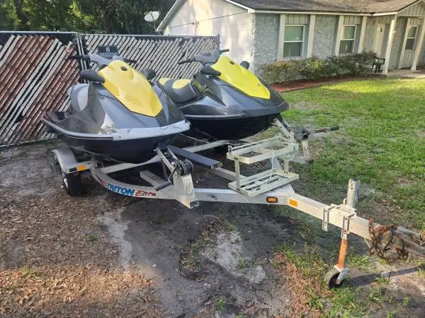 2013 and 2014 Yamaha VX Deluxe jet skis, Triton Trailer.