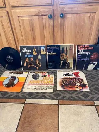 Vinyl LP records. A couple of them are Louis Armstrong. And others