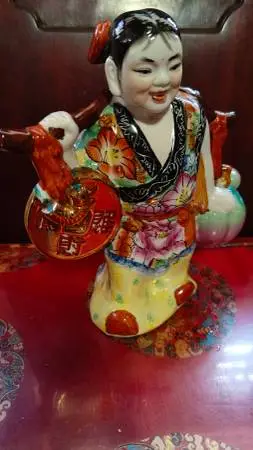 Vintage Chinese Porcelain Lady Holding Longevity Peach and Coin Statue