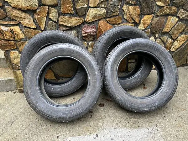 Near NEW! Four Firestone Destination LE3, 215/65R17 Tires.
