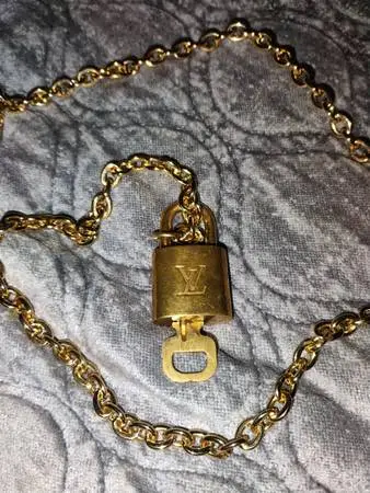 Louis Vuitton purse lock