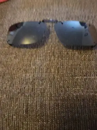 POLAROID SUN GLASS NEW CONDITION