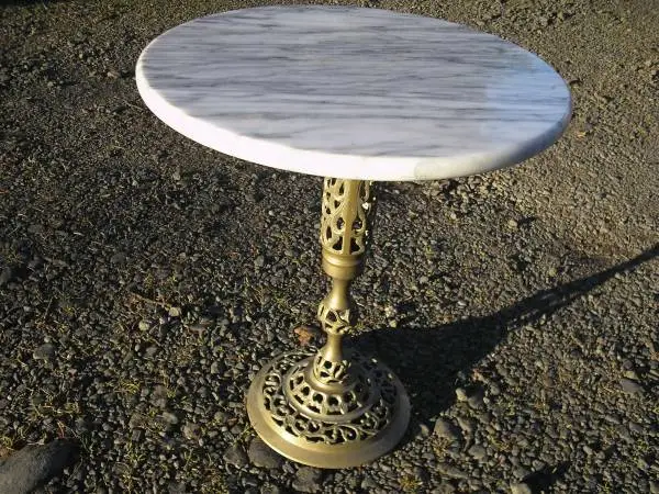 Vintage round brass and marble top pedestal table.