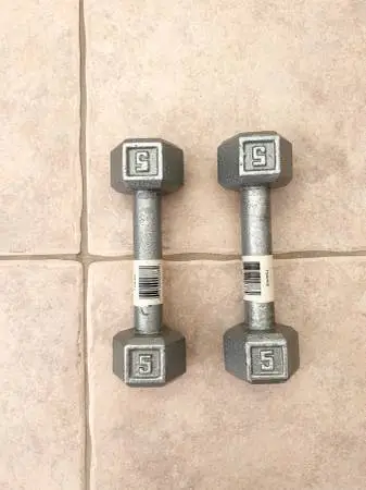 Pair of 5lb cast iron hex dumbbells.