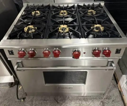 Wolf Stainless Steel 36” Gas Range/Subzero 36” Wide Fridge