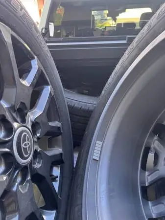 265/60/20 2024 Toyota Tundra OEM Black Factory Wheels