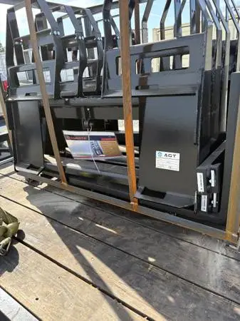 New 4000 lbs rated walk thru skid steer forks