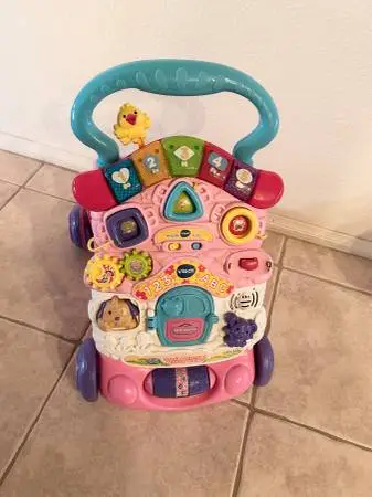 VTech strip & activity sit to stand baby/ toddler walker.