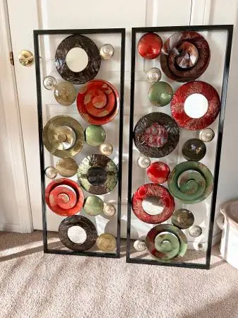Set of 2 large modern abstract metal wall art pieces.