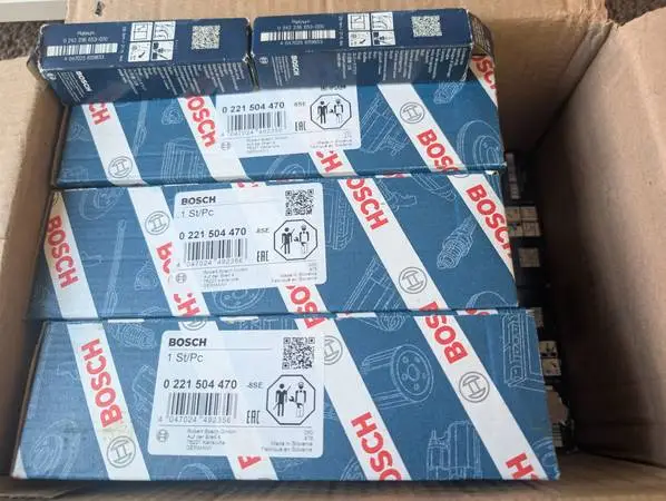 New in the Box OEM Bosch 6 Spark plugs and 6 Ignition coils