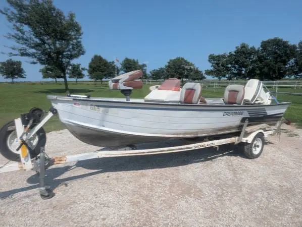 16 Foot V-Bottom “Grumman” Boat w/48 Horsepower Johnson