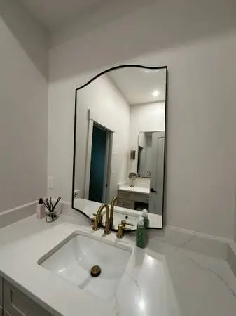 Brand new scalloped mirror black