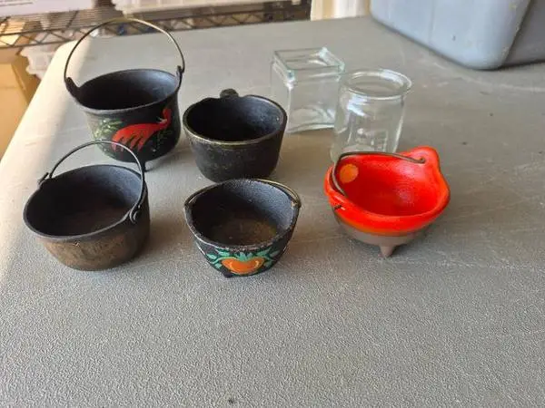7 old miniature cast and glass ground coffee grinder bean catchers