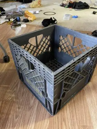 Gray and black plastic milk crates - storage tote cubes