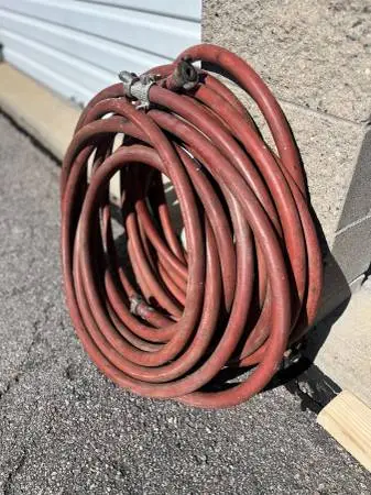 two 25 foot lengths of jackhammer hose