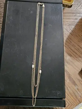 Avon gilded strand necklace with Elongated mother of pearl beads