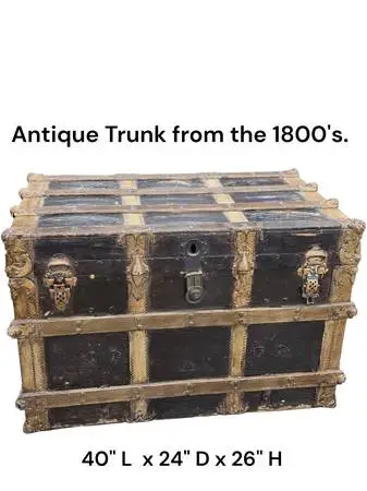 Antique flat-top steamer trunk from the late 19th century (circa 1880–
