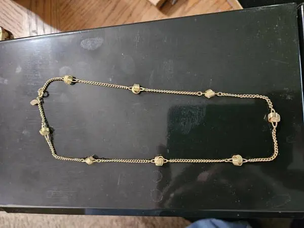 Avon necklace with decorative knots