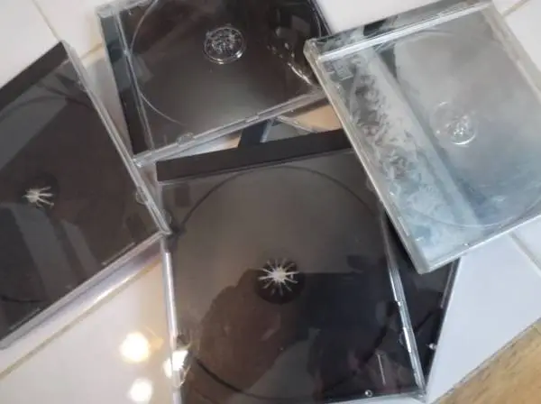 2 CD Towers and 3 Boxes of used CD Cases
